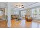 Spacious living room with hardwood floors, natural light from many windows, and comfortable seating at 1342 Dennis Blvd, Moncks Corner, SC 29461