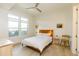 Bright bedroom with hardwood floors, a ceiling fan, and large windows that offer lots of sunlight at 135 Pier View # 305, Charleston, SC 29492
