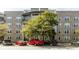 Apartment building exterior with brick facade and manicured landscaping at 135 Pier View # 305, Charleston, SC 29492