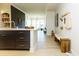 Open concept kitchen with stainless steel appliances and a breakfast bar overlooking the living area at 135 Pier View # 305, Charleston, SC 29492