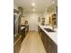 Well-equipped kitchen featuring stainless steel appliances and ample counter space at 135 Pier View # 305, Charleston, SC 29492