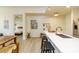 Modern kitchen features a waterfall island, stainless steel appliances, and bright, airy atmosphere at 135 Pier View # 305, Charleston, SC 29492