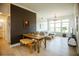 Bright living room with hardwood floors, neutral paint, and a large window showcasing natural light at 135 Pier View # 305, Charleston, SC 29492