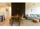 Open-concept living area with wood floors and designer finishes, perfect for entertaining guests at 135 Pier View # 305, Charleston, SC 29492