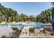 Resort-style pool and deck featuring lounge chairs and shaded pergola at 135 Pier View # 305, Charleston, SC 29492