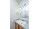 Well-lit bathroom featuring a modern sink, vanity, and updated fixtures at 137 St Phillips Row, Summerville, SC 29485