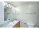 Bathroom featuring a vanity sink with updated countertop and a large mirror at 137 St Phillips Row, Summerville, SC 29485