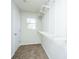 Walk-in closet with shelving and carpet flooring at 137 St Phillips Row, Summerville, SC 29485