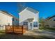 Exterior view of a well-maintained home with a wooden deck and private driveway at 137 St Phillips Row, Summerville, SC 29485