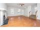 Spacious living room features a fireplace, hardwood floors, and ample natural light at 137 St Phillips Row, Summerville, SC 29485