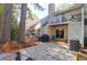 Cozy backyard with seating area, air conditioner, and plenty of tree coverage at 14 Town Park Ln # B, Charleston, SC 29412