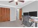 This bedroom is currently arranged as a functional office with neutral colors at 14 Town Park Ln # B, Charleston, SC 29412