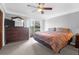 Spacious main bedroom featuring a ceiling fan and access to an outdoor balcony at 14 Town Park Ln # B, Charleston, SC 29412