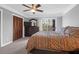 Main bedroom featuring light gray colored walls, soft carpet, and a large window at 14 Town Park Ln # B, Charleston, SC 29412