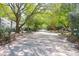 Charming street view with mature trees at 14 Town Park Ln # B, Charleston, SC 29412
