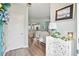 Bright entryway showcases a stylish carved cabinet and an inviting glimpse into the living spaces of the home at 1529 Fishbone Dr, Johns Island, SC 29455