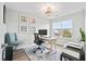 Bright office with a modern desk, comfortable chair, and natural light from the window at 1529 Fishbone Dr, Johns Island, SC 29455