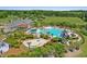 Aerial view of resort-style pool and splash park with towering waterslide and landscaped grounds at 1537 Sweet Myrtle Cir, Mount Pleasant, SC 29466