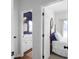 Bright hallway view into the bedroom and bathroom, showing a neutral color palette and wood-look flooring at 1537 Sweet Myrtle Cir, Mount Pleasant, SC 29466