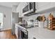 Close-up showcasing the stainless steel appliances, white subway tile, and countertops at 1537 Sweet Myrtle Cir, Mount Pleasant, SC 29466