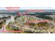 Aerial view showcases the lake system, community pool, boathouse, and well-manicured lawns around 154 Calm Water Way at 154 Calm Water Way, Summerville, SC 29486