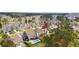 An aerial view highlights the private backyard pool and scenic views of the surrounding lush landscape at 154 Calm Water Way, Summerville, SC 29486