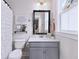Charming bathroom featuring a vanity with storage, decor, and a framed mirror at 154 Calm Water Way, Summerville, SC 29486