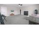 Large bonus room with comfortable seating, entertainment, and potential for versatile use at 154 Calm Water Way, Summerville, SC 29486
