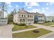 Desirable neighborhood featuring a well-manicured lawn and close proximity between homes at 154 Calm Water Way, Summerville, SC 29486