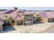 An updated Cane Bay Elementary School with red roofs, neatly trimmed bushes, a sidewalk and benches at 154 Calm Water Way, Summerville, SC 29486