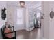 Bright and airy foyer with hardwood floors and a view into the adjacent office at 154 Calm Water Way, Summerville, SC 29486