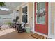 Charming front porch with rocking chairs and a cozy atmosphere at 154 Calm Water Way, Summerville, SC 29486