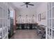 Spacious home office featuring built-in desks, natural light, and a comfortable workspace at 154 Calm Water Way, Summerville, SC 29486