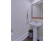 Elegant powder room showcasing a pedestal sink, decorative mirror, and stylish accents at 154 Calm Water Way, Summerville, SC 29486