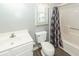 Clean bathroom with white vanity, toilet, and shower/tub at 1561 Montclair St, Charleston, SC 29407