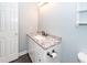 Bathroom featuring a granite vanity with a stylish faucet and cabinet at 1561 Montclair St, Charleston, SC 29407