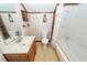 Small bathroom featuring a vanity, toilet and bathtub with shower at 1561 Montclair St, Charleston, SC 29407
