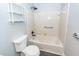 Updated bathroom with tiled shower, new fixtures, and fresh paint at 1561 Montclair St, Charleston, SC 29407