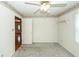 Neutral bedroom with ceiling fan and adjacent room access at 1561 Montclair St, Charleston, SC 29407