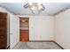Neutral bedroom with wall trim and a view into another room at 1561 Montclair St, Charleston, SC 29407