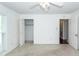 Bright bedroom with neutral carpet, two closets, and great window views at 1561 Montclair St, Charleston, SC 29407