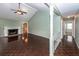View of the living room flowing into a hallway with access to other rooms at 1561 Montclair St, Charleston, SC 29407