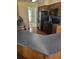 A kitchen with stainless steel appliances, and blue countertops at 1561 Montclair St, Charleston, SC 29407