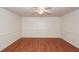 Cozy living room with hardwood floors, ceiling fan, and ample natural light at 1561 Montclair St, Charleston, SC 29407