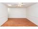 Cozy living room with hardwood floors, ceiling fan, and ample natural light at 1561 Montclair St, Charleston, SC 29407