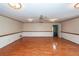 Spacious living room with hardwood floors, neutral walls and a ceiling fan at 1561 Montclair St, Charleston, SC 29407