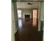 A formal living room with fireplace, hardwood floors, and neutral color palette at 1561 Montclair St, Charleston, SC 29407