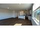 Open-concept kitchen featuring stainless steel appliances, island, and granite countertops at 158 Yarrow Way, Moncks Corner, SC 29461