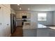 Kitchen with granite countertops, stainless steel appliances, and a large island with sink at 158 Yarrow Way, Moncks Corner, SC 29461