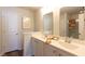 Well-lit bathroom featuring a double vanity with white cabinetry and modern fixtures at 160 Yarrow Way, Moncks Corner, SC 29461
